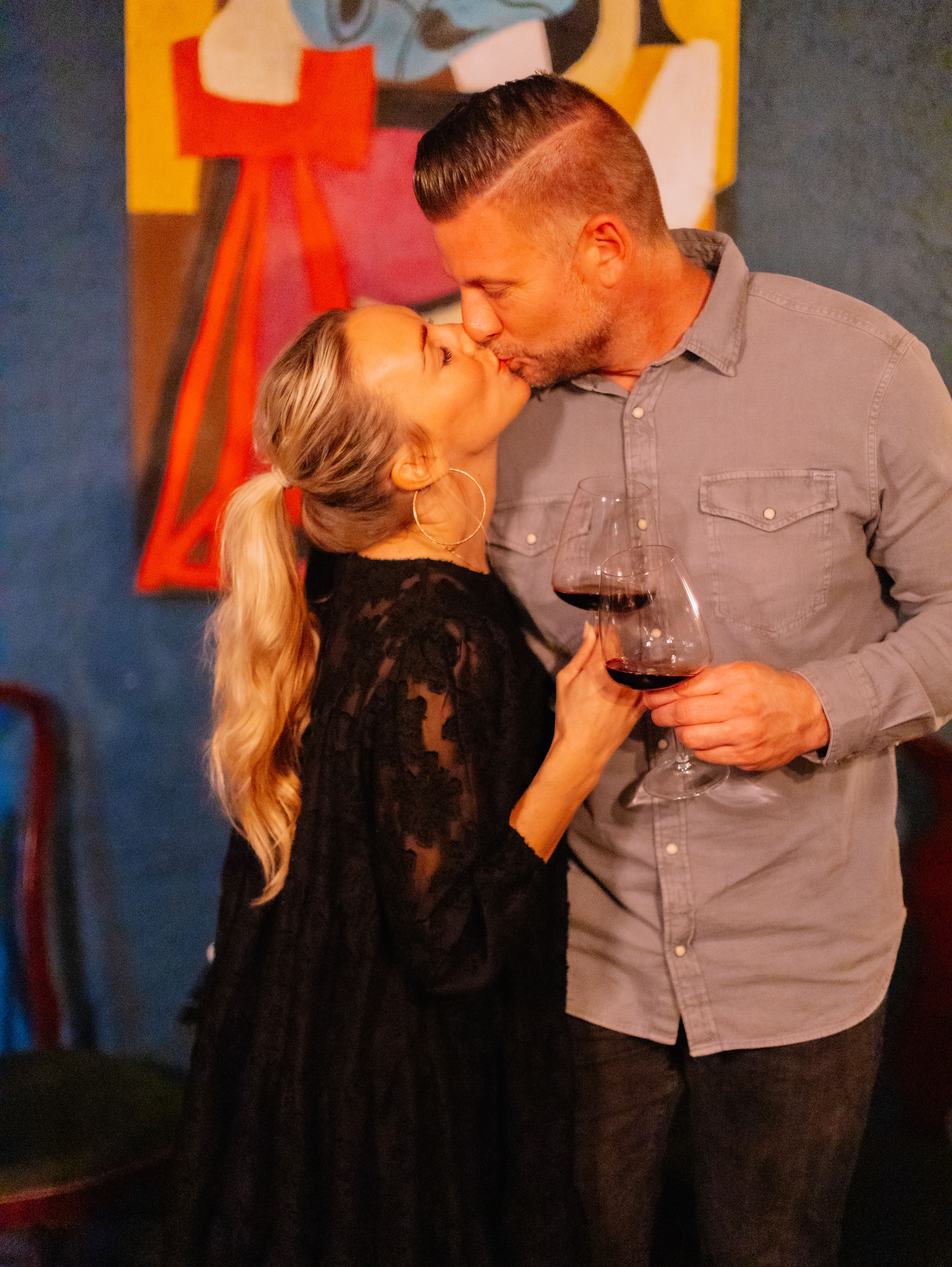 Couple with red wine at private event in Aurum Lounge Port Andratx